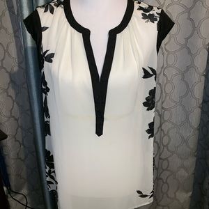 Sheer cream top. Where it alone or with cami.😎